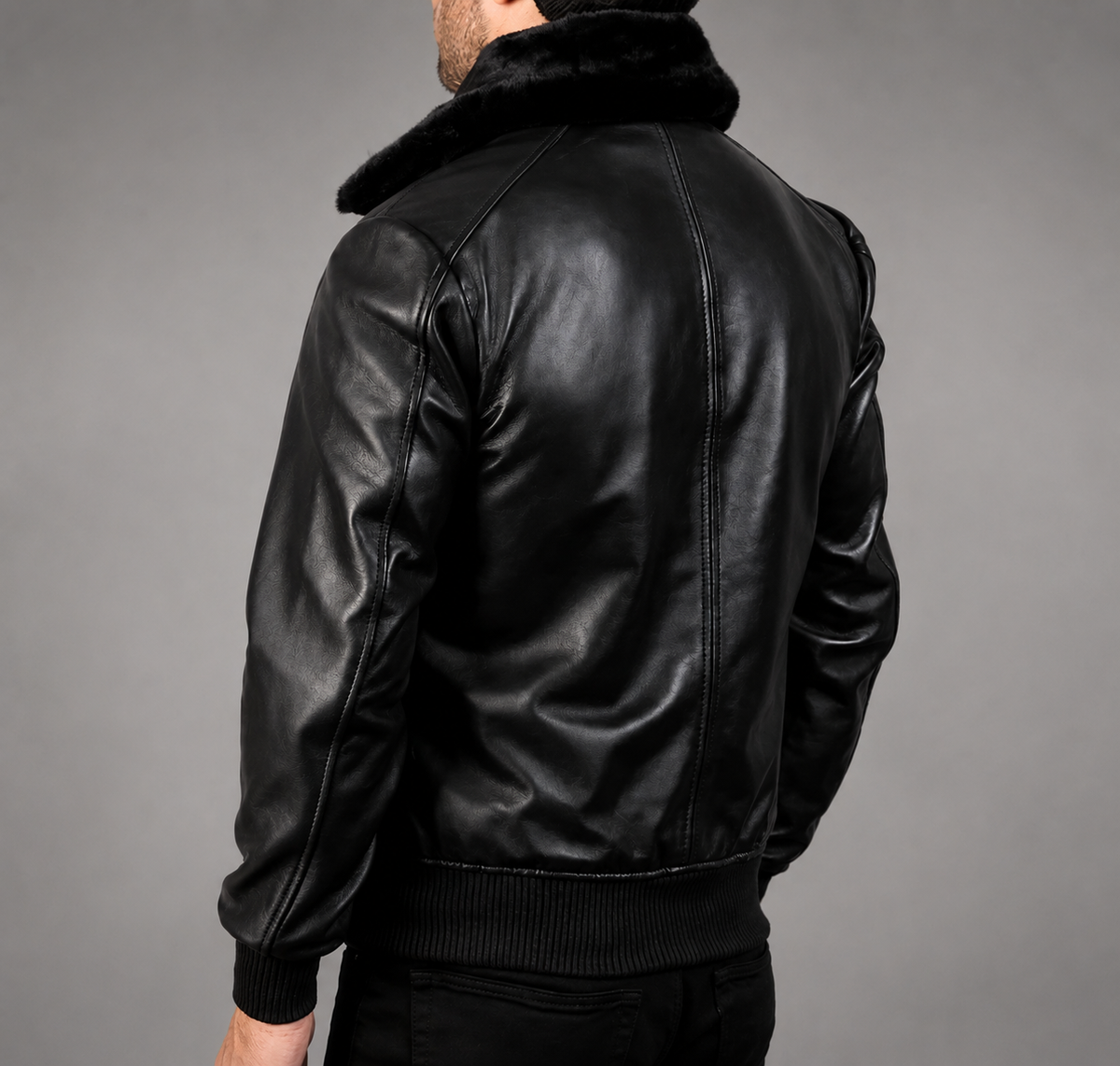 **Title:** Men’s Black Leather Bomber Jacket with Faux Fur Collar